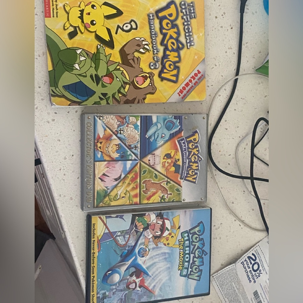 Bundle of Pokémon movies and collectors book